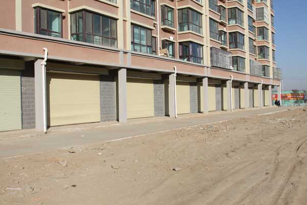 蘭州市高新開(kāi)發(fā)區(qū)經(jīng)濟(jì)適用房工業(yè)門案例 - 中出網(wǎng)-智能出入口與停車充電門戶