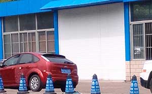 廣西車管所大型鋁合金卷簾門案例 - 中出網(wǎng)-智能出入口與停車充電門戶